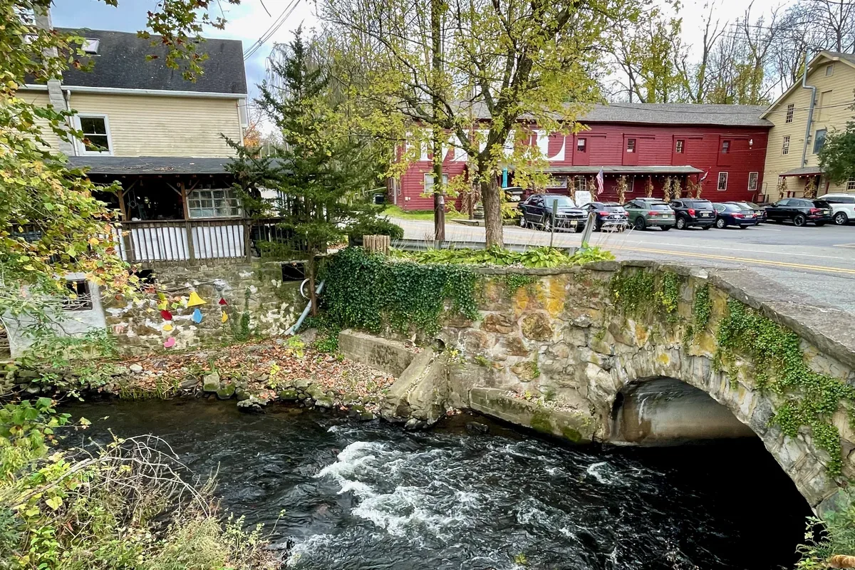 Stone arch bridge over the Paulins Kill in Lafayette Village, Lafayette Township, New Jersey